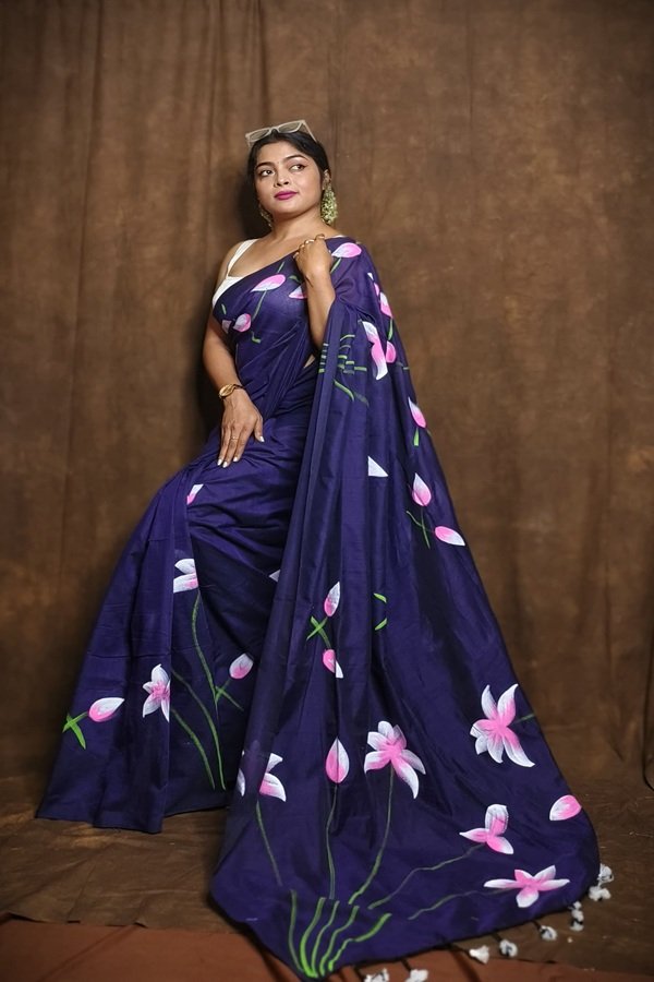 blue khadi lotus handpainted saree draped on model by swamini sarees