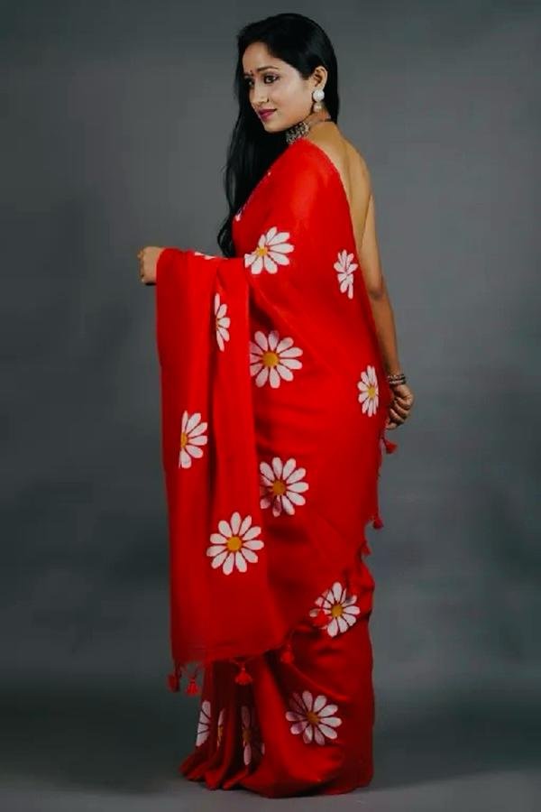 pallu view of Red Khadi Sunflower Block Print Saree – handcrafted by swamini Sarees