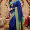 blue paithani silk kalanjali butti saree draped on model by swamini sarees