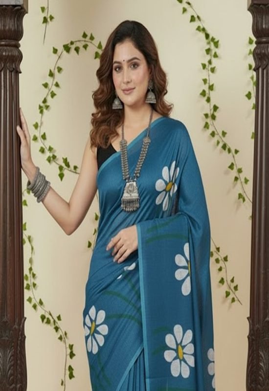 Teal blue Mul cotton saree featuring handpainted white daisy floral motifs for summer front side view by swamini sarees