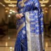 traditional wedding festive blue banarasi silk saree draped on model by swamini sarees