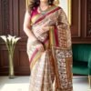beige brown red floral tussar silk saree front view draped on model by swamini sarees