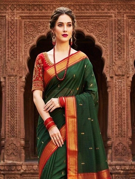 elegant green and red cotton silk maheshwari saree light weight breathable traditional draped on model front view by swmaini sarees