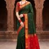 elegant green and red handloom maheshwari saree light weight breathable traditional draped on model front view by swmaini sarees