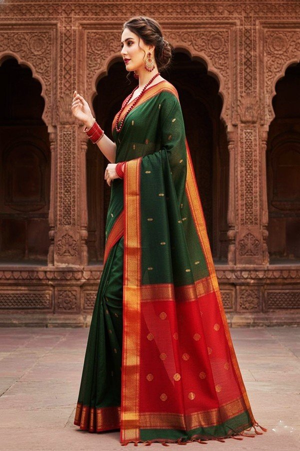 elegant green and red cotton silk maheshwari saree light weight breathable traditional draped on model side view by swmaini sarees