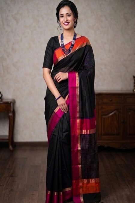 black maheshwari cotton silk ganga jamuna border saree front view draped on a model by swamini sarees