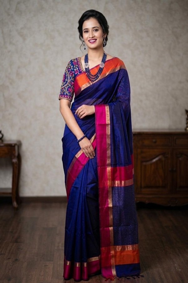 blue maheshwari cotton silk ganga jamuna border front view draped on model by swamini sarees