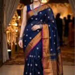 blue parijat prajakta flower embroidery bronze golden border saree draped on model front view by swamini sarees