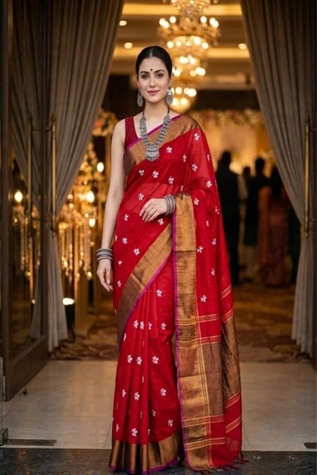 red parijat prajakta flower embroidery bronze golden border saree draped on model front view by swamini sarees